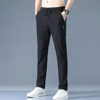 Мъжките ежедневни панталони, летни обикновена дишащи прави панталони с джоб на съвсем малък, мъжки тънки бързо съхнещи спортни панталони